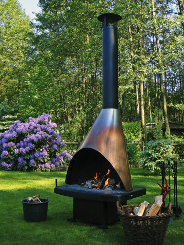 outdoor chimney with copper chimney cover
